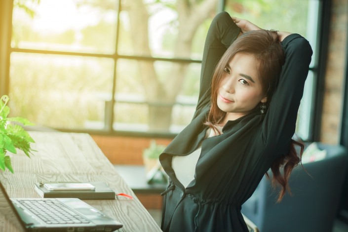 Asian business women to exercise to reduce fatigue from work,sof