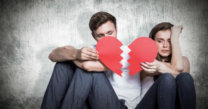 composite-image-of-young-couple-holding-broken-heart
