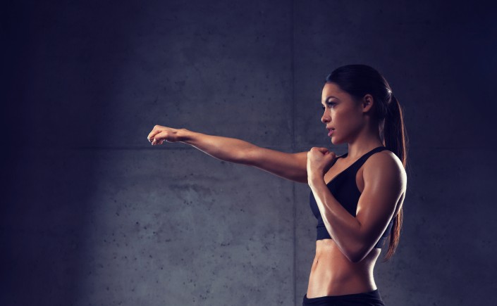 woman boxing in gym