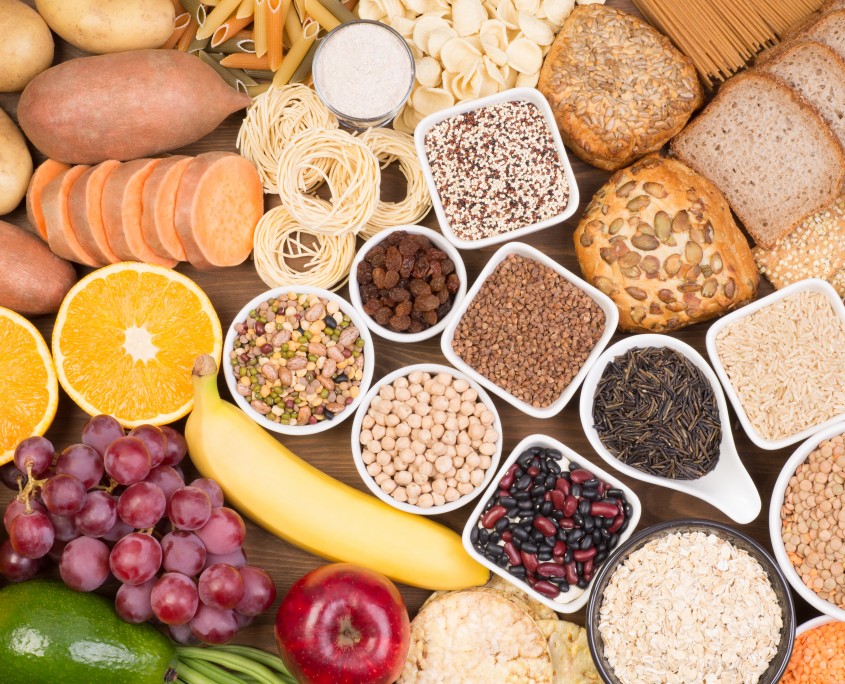 Carbohydrates food sources, top view on a table